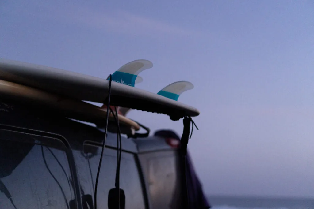 Surfboards laying on top of a car in Pantin, Valdoviño, Galicia