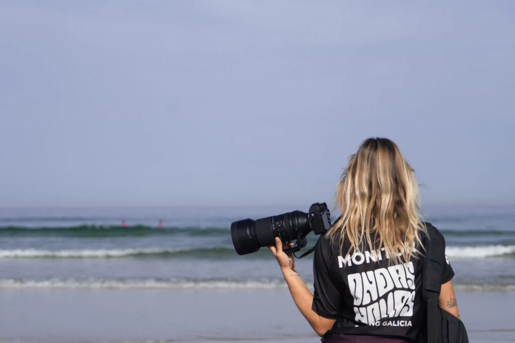 A surfphotographer capturing the waves of students