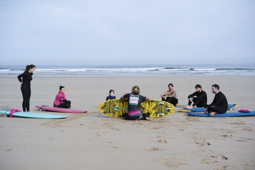 Our instructior giving details about surfing to our students during a surf lesson in Pantin
