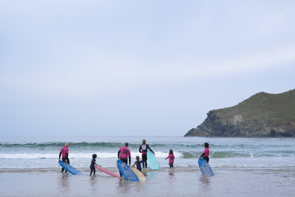 Our instrucor going in with a Family Lesson, perfect sunny and perfect waves in Pantin