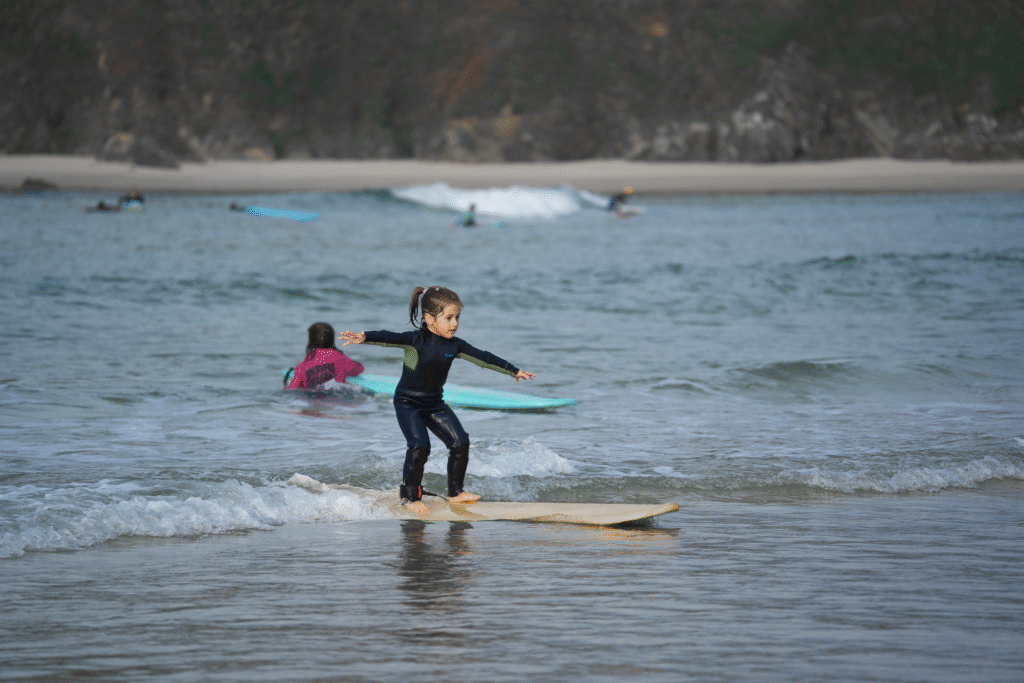 Our junior student having her first waves in Pantin, Valdoviño